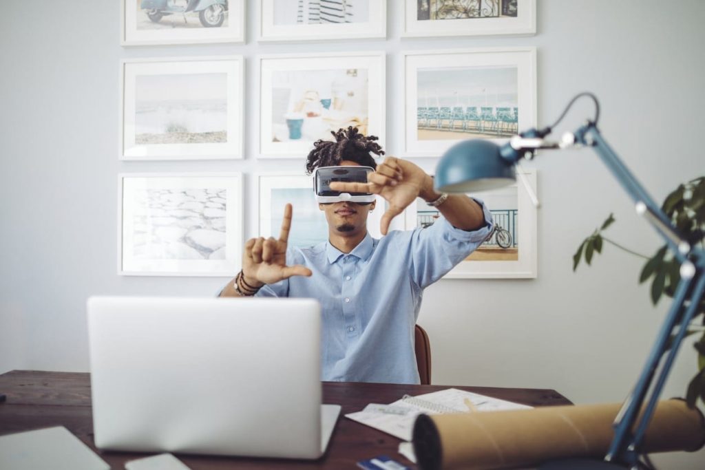 Generation Z man working from home with VR technology