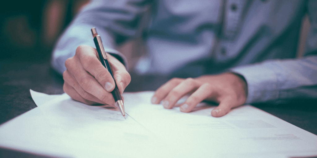 Worker signing an employer contract