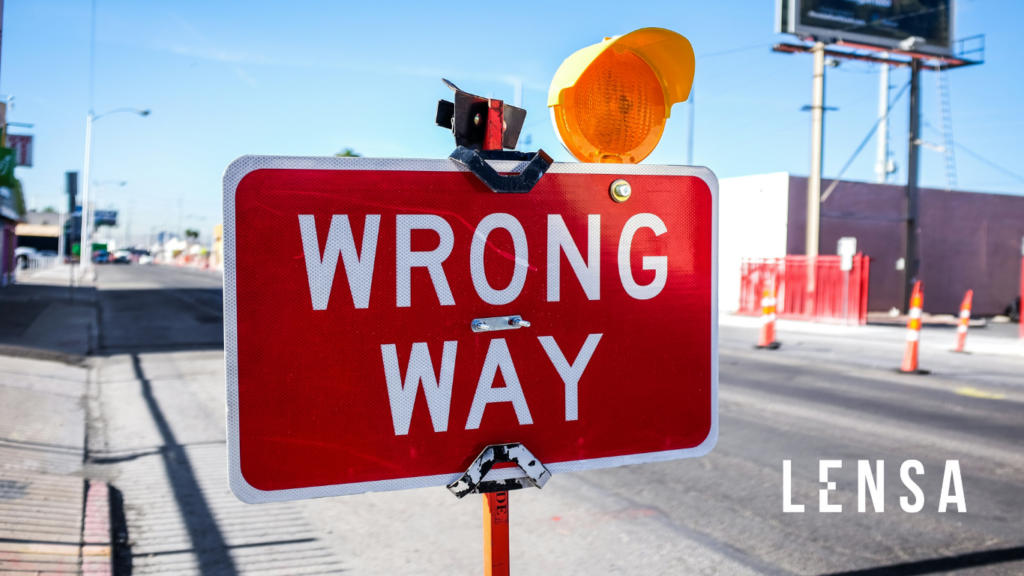 Road sign with the words 'Wrong Way,' symbolizing common mistakes made by job seekers that can alienate recruiters
